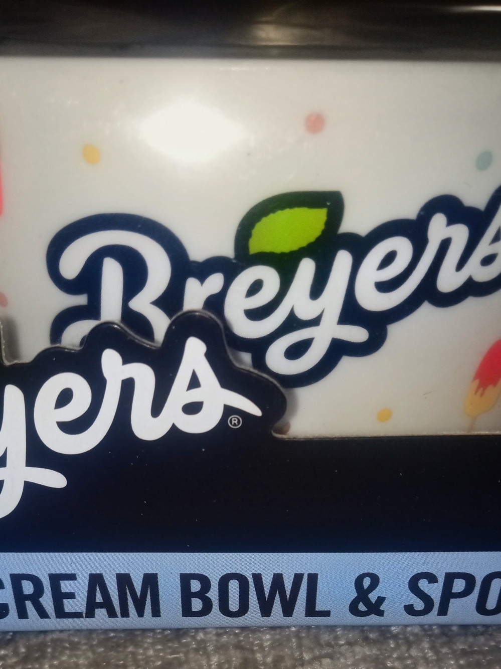 Breyer White Bowl with Navy Logo and Green Leaf Accent
